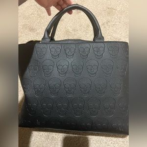 Used black skull Betsey Johnson purse